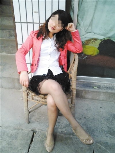 　2012年6月張貴英上傳到QQ空間的一張照片，拍攝于宜賓市金發(fā)街。今年上半年，張貴英在宜賓打工。